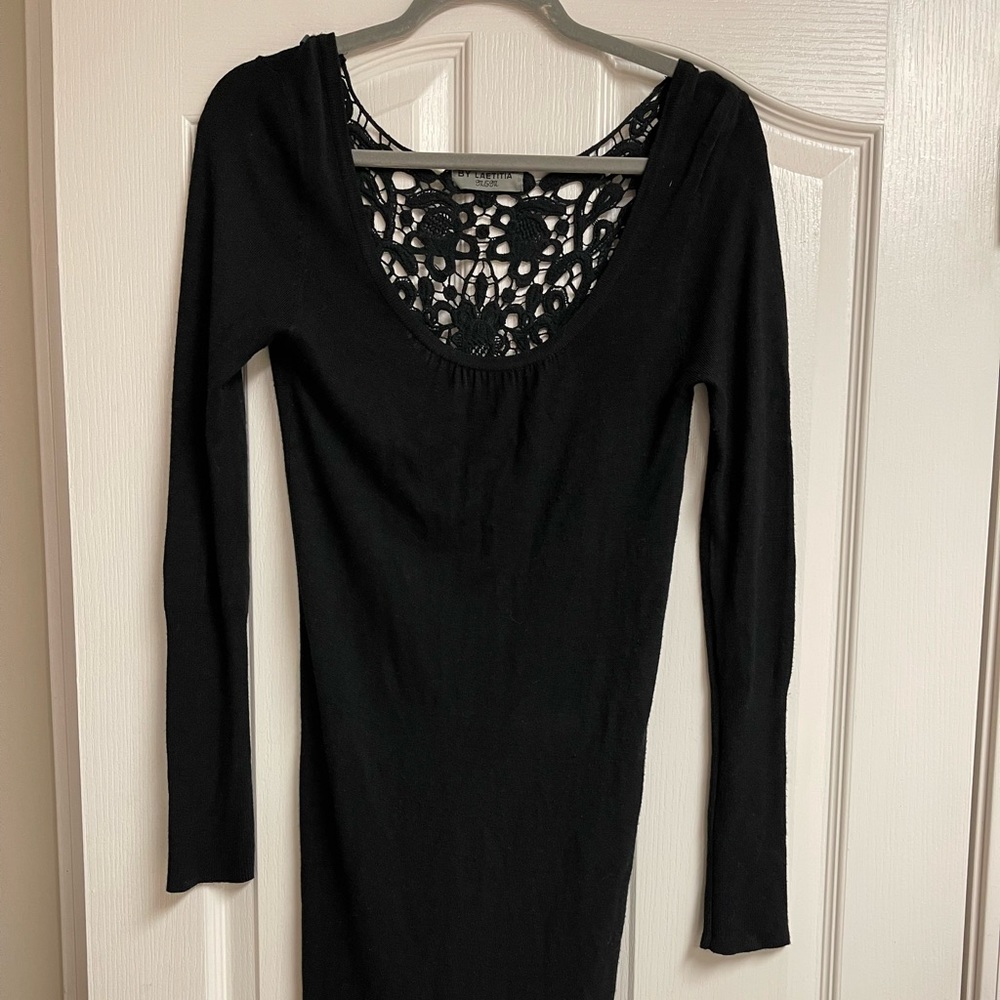 Sweater dress with crocheted back